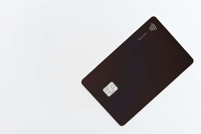 Minimalist blue credit card icon with shield emblem and 'Extended Warranty' label